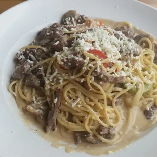 Fideo with steak and mushrooms.