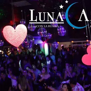 a crowd of people at a party