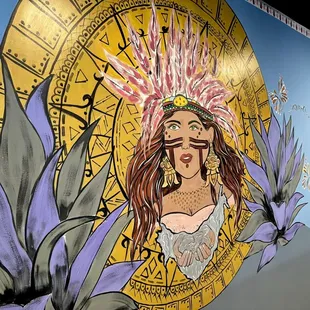 a woman with a headdress and a sundial