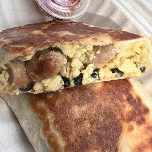 Breakfast Burrito (add sausage) with a side of Pico (side)