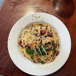 Create your own pasta ($9)- Angel hair, Lemon White Wine sauce, mushroom, spinach, pine nuts, crispy pancetta (+$2)