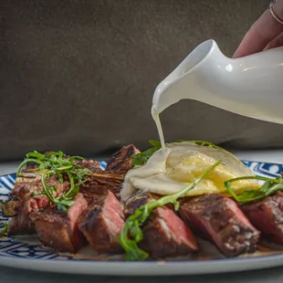 BISTECCA ALLA FIORENTINA FOR TWO
Wood Grilled, 32 ounce Porter House Steak. Served with Cacio e Pepe Ravioli