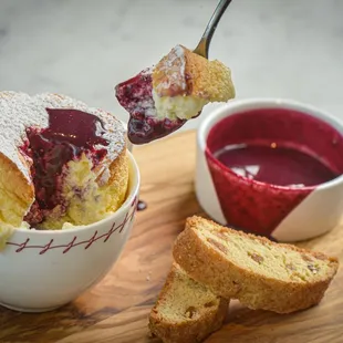 LIMONCELLO SOUFFLE
Blueberry Anglaise &amp; Candied Lemon Biscotti