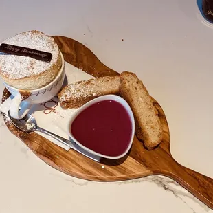 Amalfi Lemon Soufflé with a berry sauce and lemon biscotti