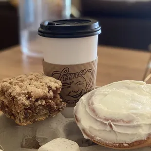 a cup of coffee and a doughnut