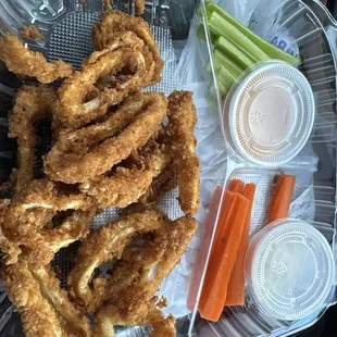 Calamare snack! Tender calamari, well seasoned with a delightful crispy breading, complete with carrots and celery (a lovely surprise!)