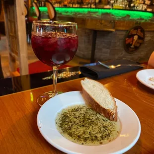 House made sangria and bread with house made oil.