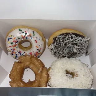 Glazed old fashioned, raised vanilla sprinkled, chocolate and vanilla coconut donuts!