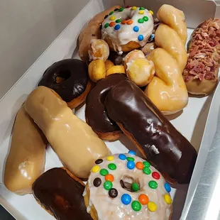 a variety of doughnuts in a box
