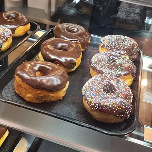 chocolate frosted donuts with sprinkles