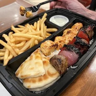 Chicken kabob with grilled steak. Tender and flavorful pieces of beef.
