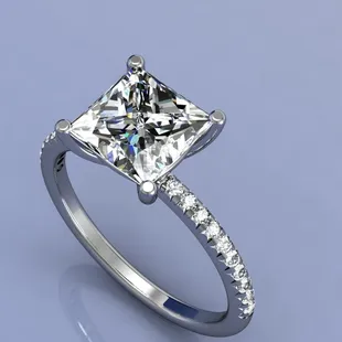 Princess cut engagement ring with micro pave&apos;d diamonds on band
