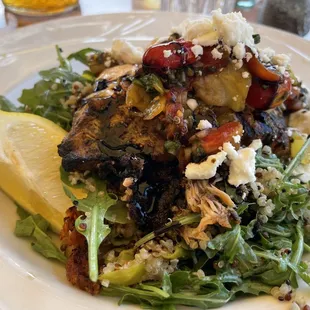 Grilled spinach salad with quinoa, olives, feta, pepperoni and a tasty vinaigrette - really flavorful and delicious!