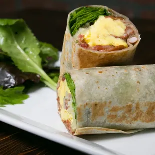 Breakfast burrito - Mexi/Cali - cage-free scrambled eggs, pinto beans, jack cheese, bacon, potatoes, salsa verde  +  spinach
