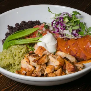 - Protein Bowl - grilled chicken, pinto beans, sweet potato, avocado, salsa fresca, cabbage slaw, arroz verde