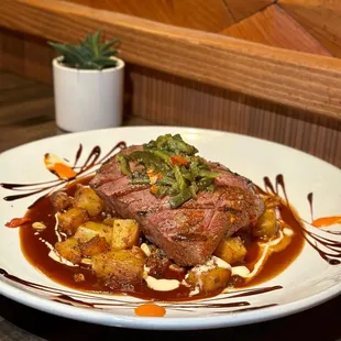 Steak Adobado w/chorizo hash potatoes