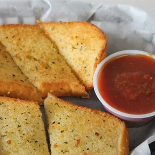 Garlic Bread w/ warm pizza sauce - Now with more garlic.
