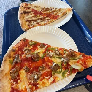 Chicken parm slice and sausage peppers and onion slice