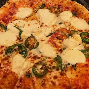 Mozzarella, ricotta, spinach and jalapeños. Yum.