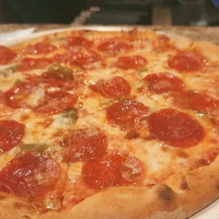 Pepperoni and green chili pizza