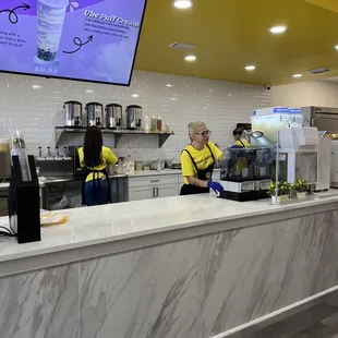two people working at the counter
