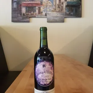 a bottle of wine on a table