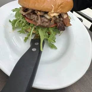 Bacon Burger  with fresh ingredients like arugula.