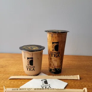 Milk tea. One regular and one large size