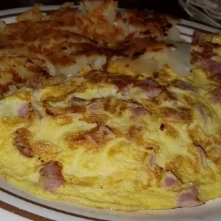 3 eggs omelet with hashbrowns potato...