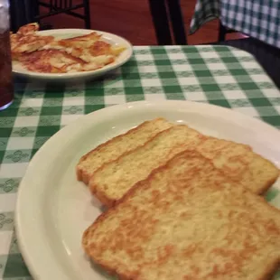 Light french toast made with egg whites and a side of home fries