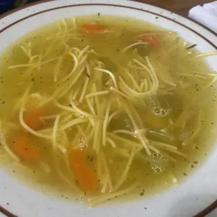 a bowl of chicken noodle soup