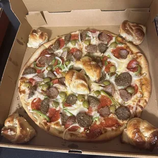 Luna Extravaganza Pizza minus mushrooms and add green olives.