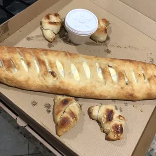 Stromboli filled with sausage and ricotta.