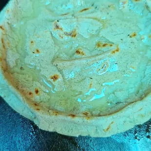 a tortilla being cooked