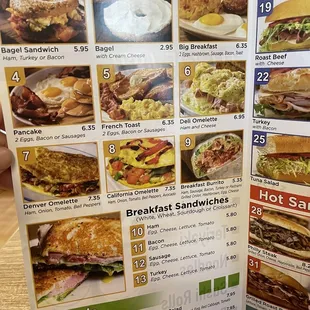 a menu for breakfast sandwiches and salads