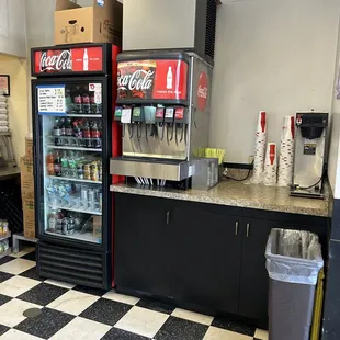 a soda cooler and a soda dispenser