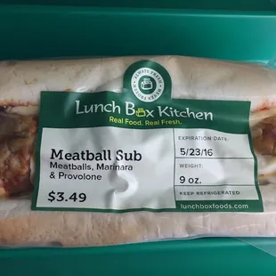 a meatball sub wrapped in plastic