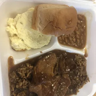 meat, beans, and mashed potatoes