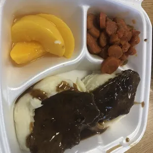 meat, mashed potatoes, carrots, and potatoes