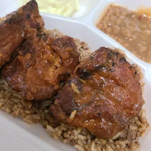 two pieces of meat and rice