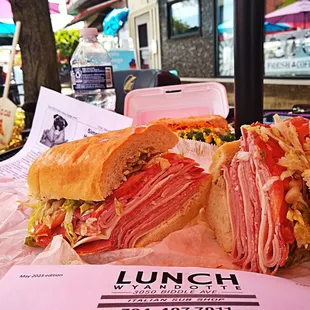 a sandwich with meat and vegetables