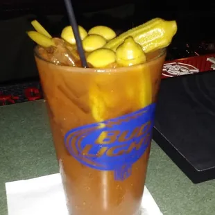 a bloody drink with pickles in it