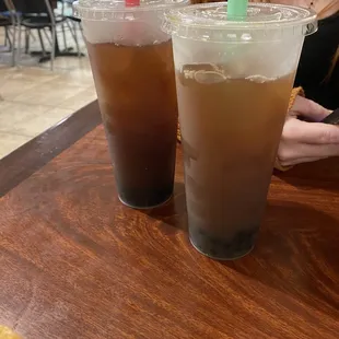 Peach black tea with boba and pineapple black tea with boba