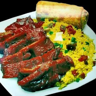 a plate of meat and rice