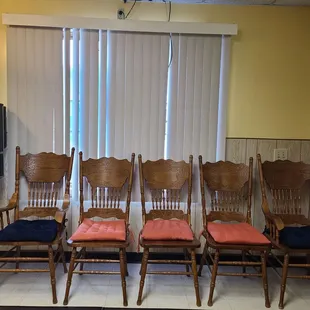 a row of chairs in a waiting room