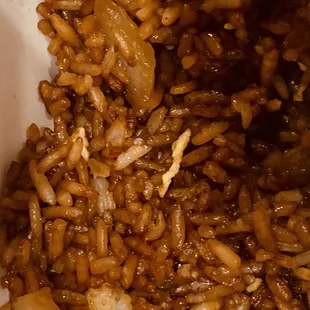 a bowl of rice and mushrooms