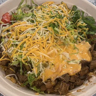 Steak bowl. I requested &quot;queso&quot; in addition to the shredded cheese.