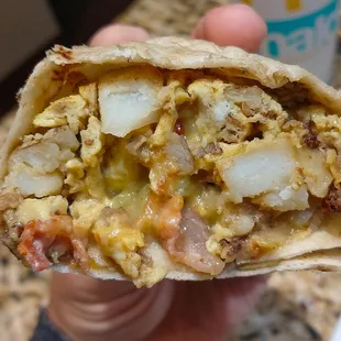 Sausage and bacon breakfast burrito. Yum!