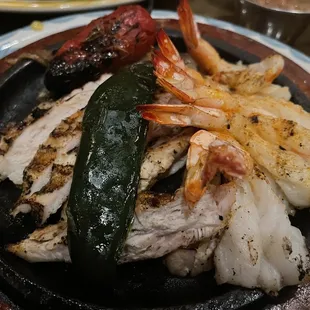 1/2 lb chicken and shrimp fajitas