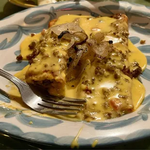 I am not a fan of my enchiladas to be covered in cheese. The carne sauce was good though and I loved the charred onions on top.